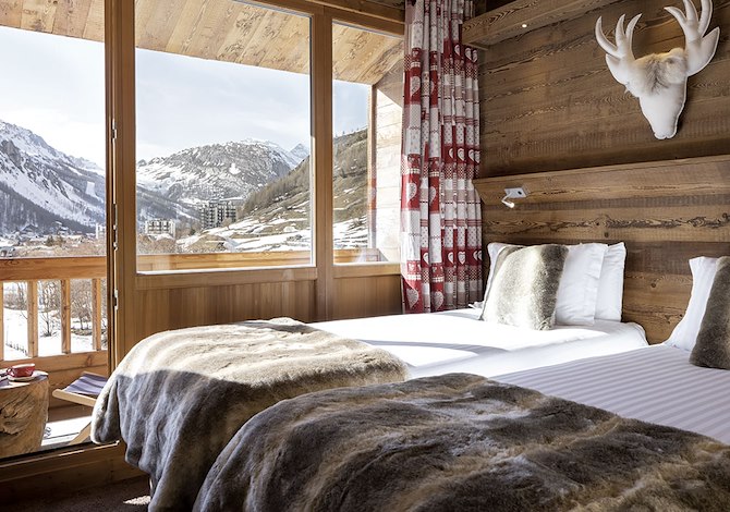 Chambre 3 personnes (2adultes+1enfant) Demi pension - Hôtel Ski Lodge 3* - Val d’Isère Centre