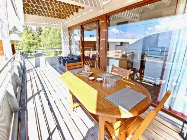 Esprit chalet pour cet appartement avec balcon exposé Sud idéalement situé. - Chamrousse