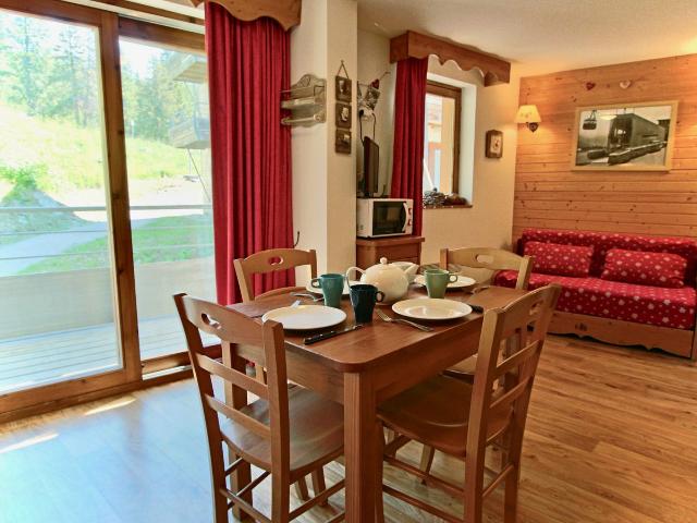 Esprit chalet pour cet appartement proche de toutes commodités - Chamrousse