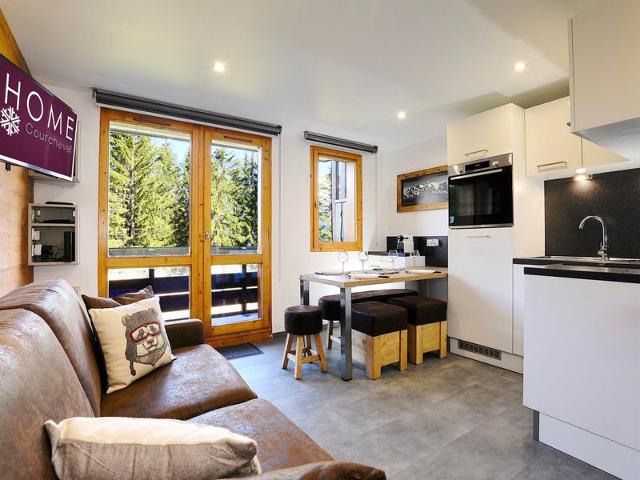 NOUVEAUTE ! Nid Douillet renové ski aux pieds !
